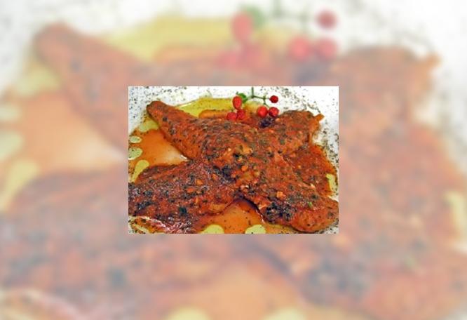 Hake with spicy tomato sauce